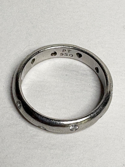 Tiffany & Co. platinum eternity band ring with diamonds.