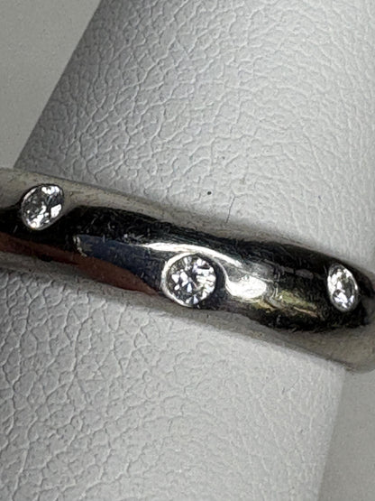 Tiffany & Co. platinum eternity band ring with diamonds.