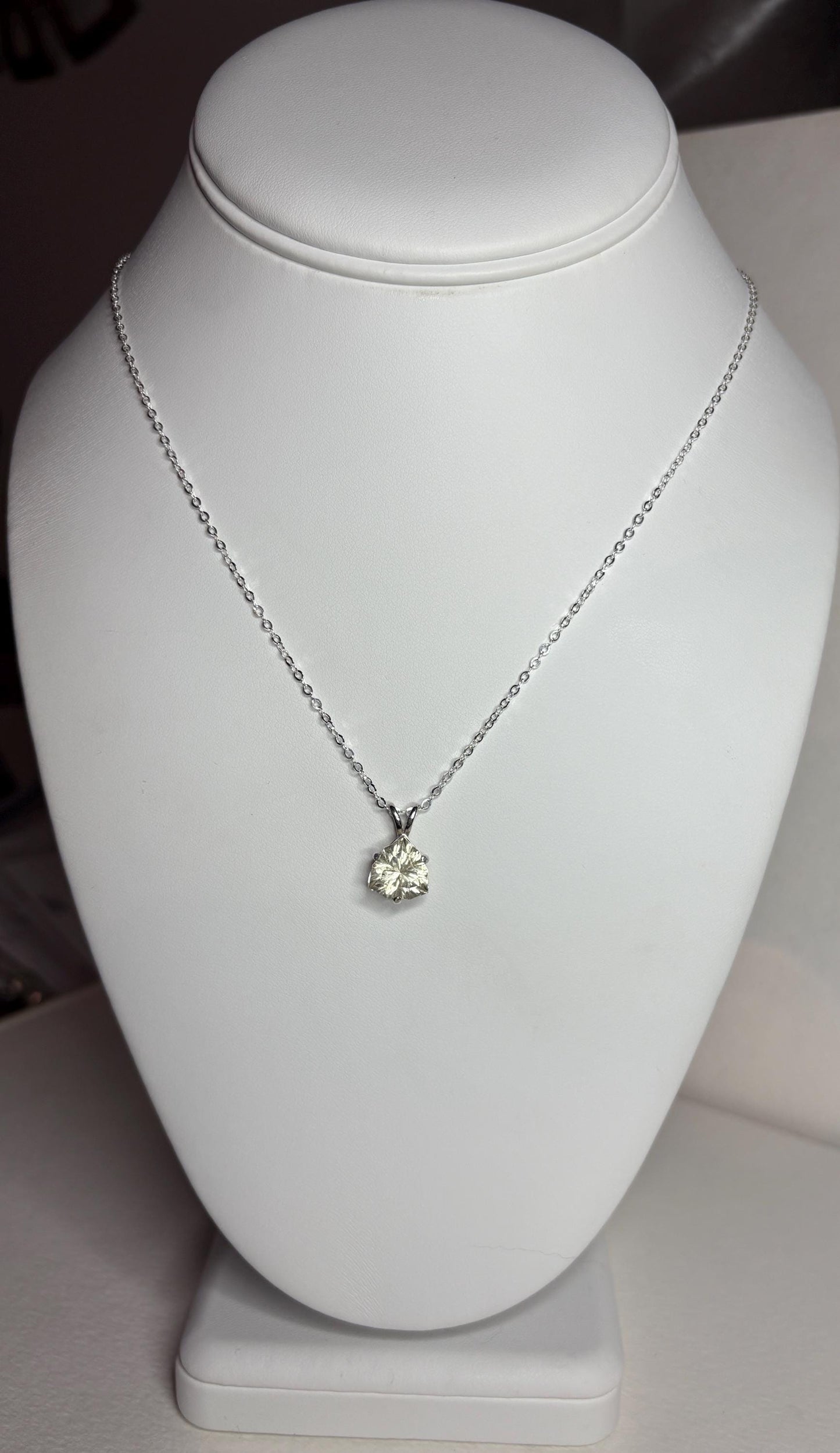 Sterling silver pendant necklace with a 10mm trillion-cut Oregon sunstone.