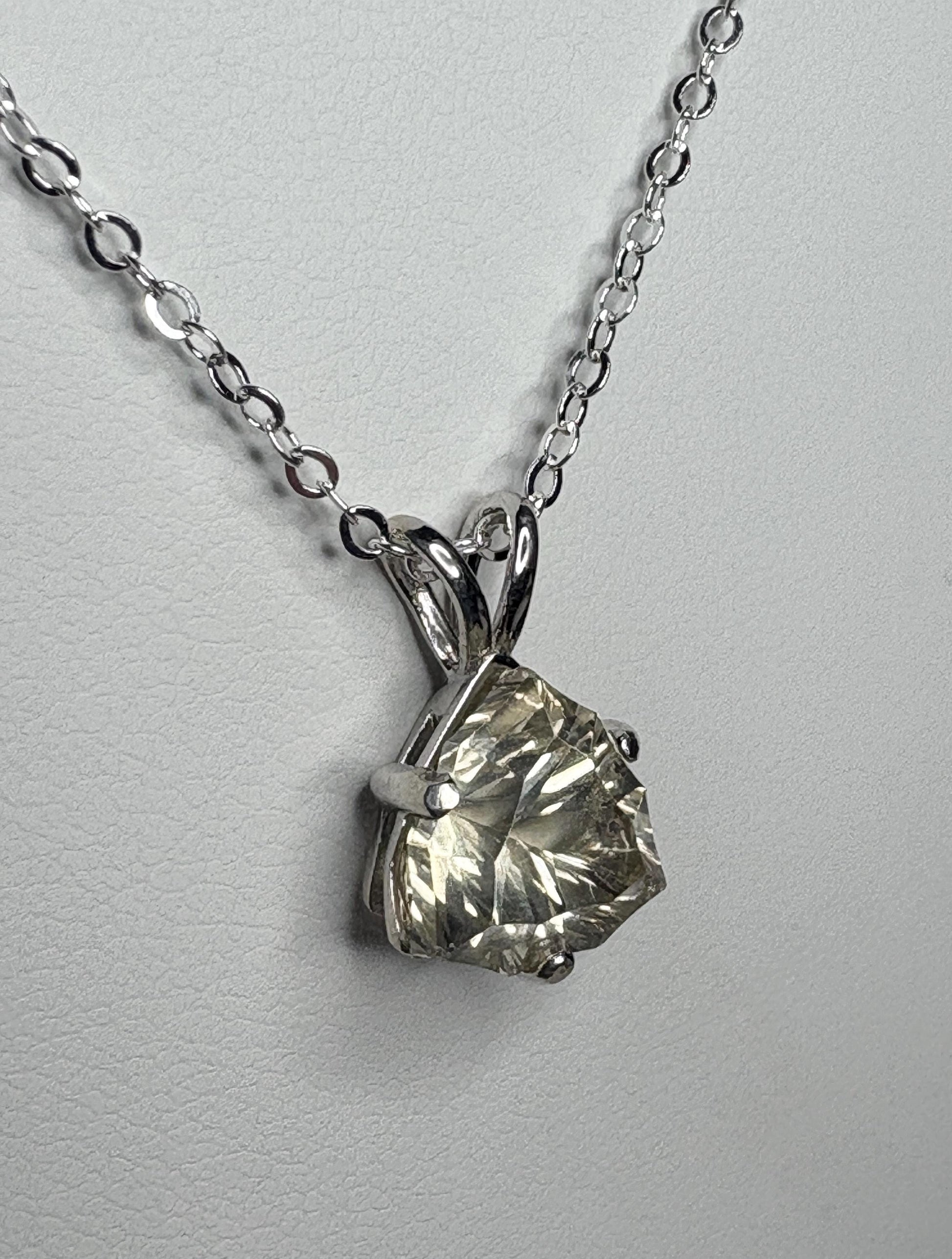 Sterling silver pendant necklace with a 10mm trillion-cut Oregon sunstone.