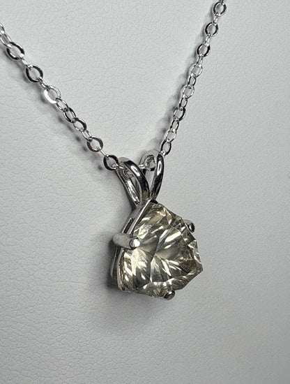 Sterling silver pendant necklace with a 10mm trillion-cut Oregon sunstone.