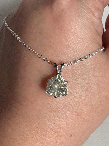 Sterling silver necklace with a 10mm trillion-cut Oregon sunstone pendant.