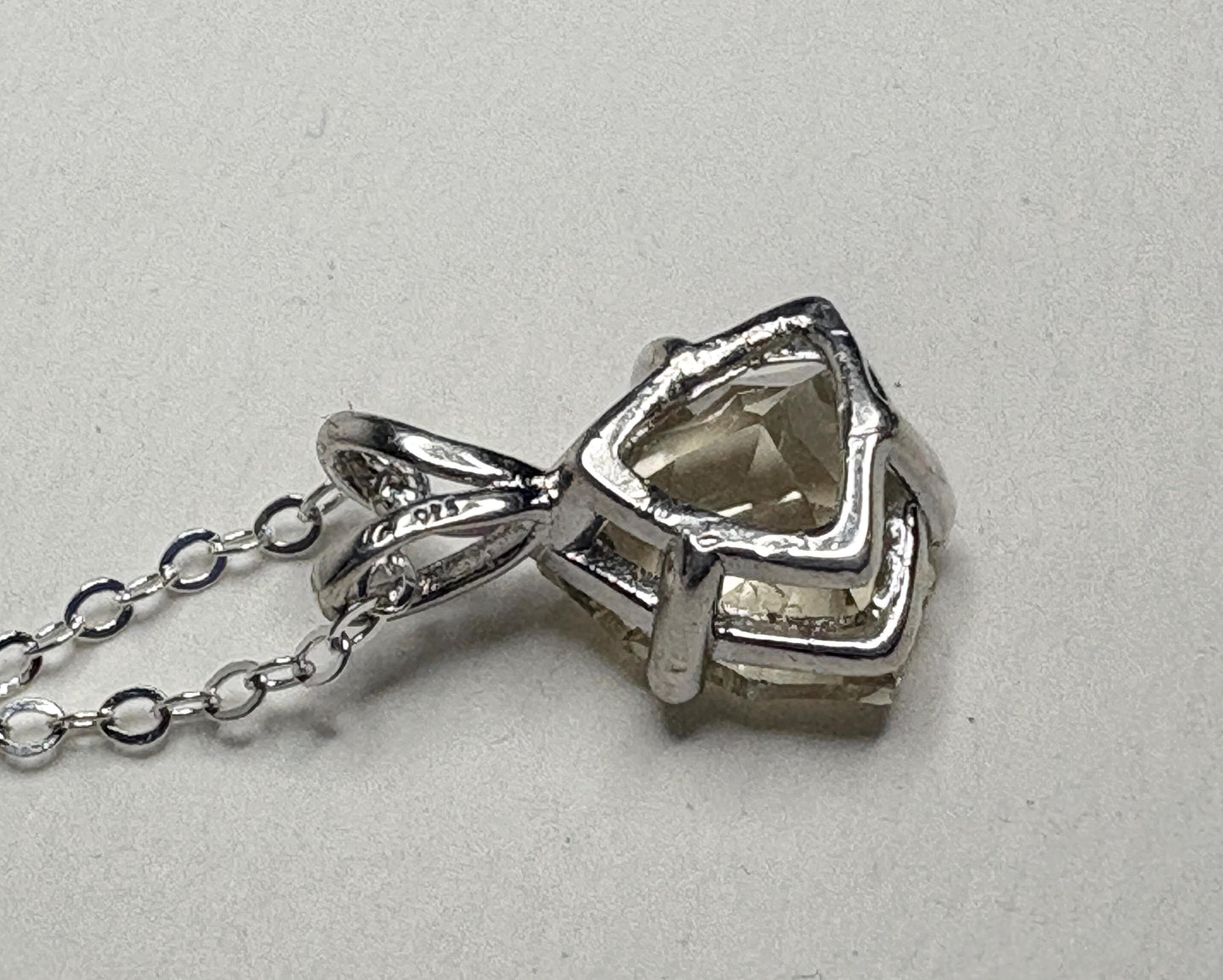 Sterling silver pendant necklace with a 10mm trillion-cut Oregon sunstone.