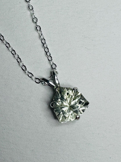 Sterling silver pendant necklace with a 10mm trillion-cut Oregon sunstone.
