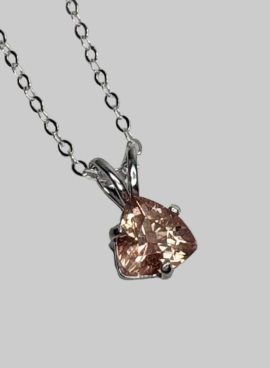 Sterling silver pendant necklace with a peach trillion-cut Oregon sunstone.