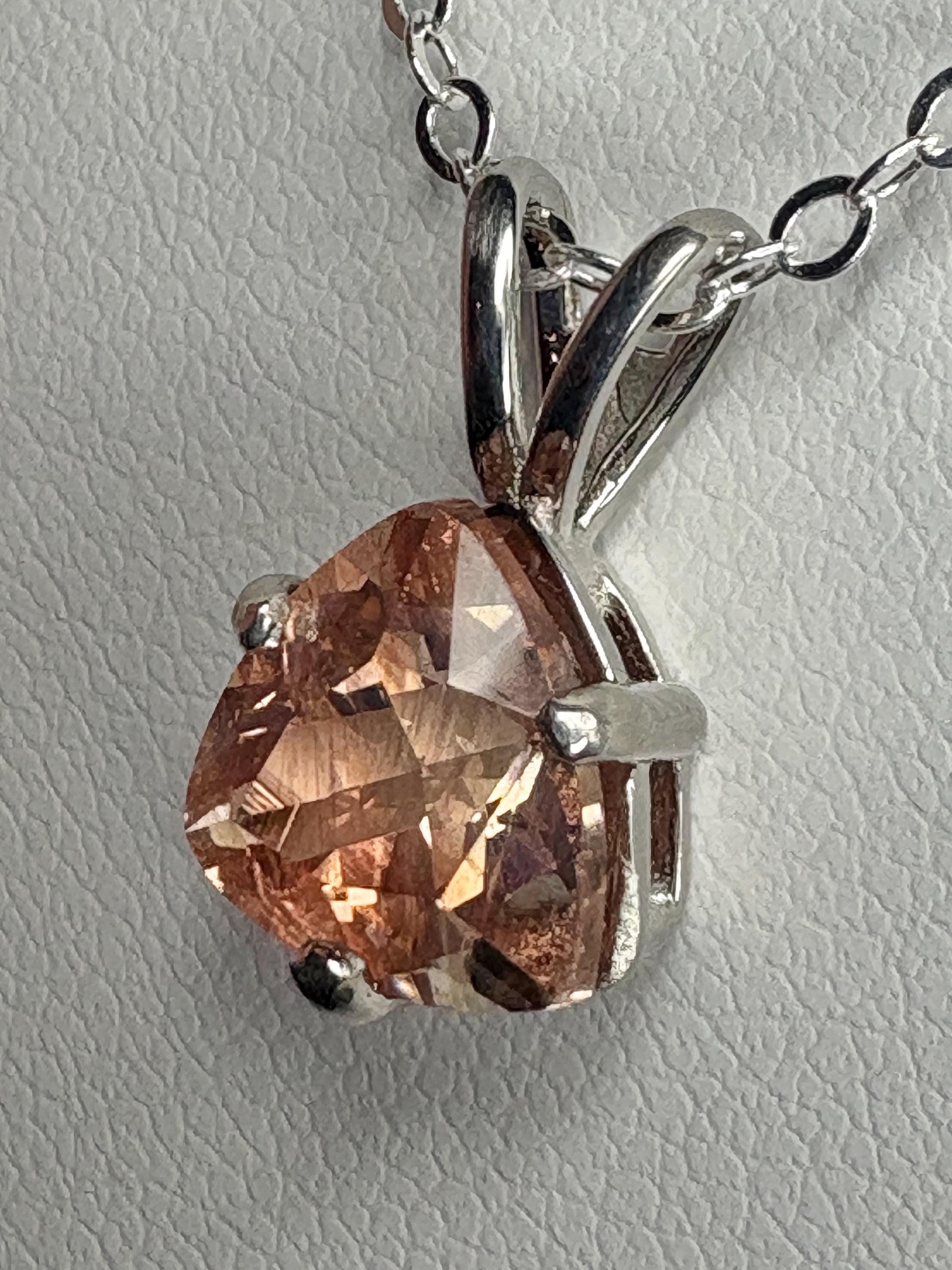 Sterling silver pendant necklace with an 8mm peach Oregon sunstone.