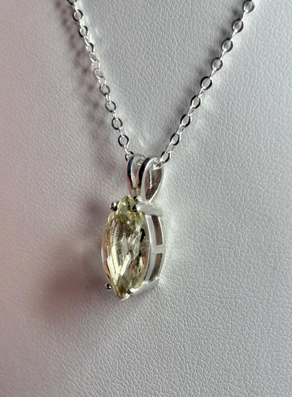 Sterling silver necklace with a marquise-cut Oregon sunstone pendant.