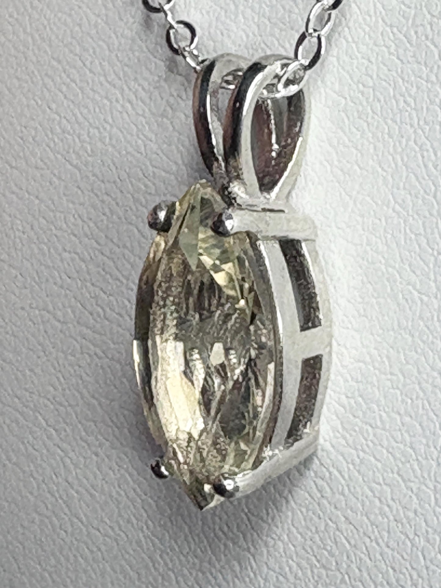 Sterling silver pendant necklace with a marquise-cut Oregon sunstone.