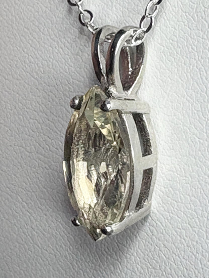 Sterling silver pendant necklace with a marquise-cut Oregon sunstone.