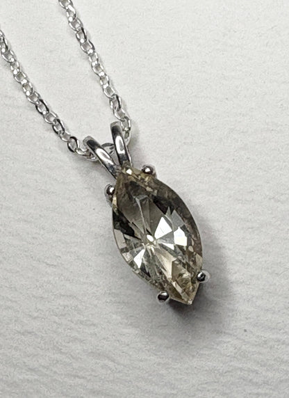 Sterling silver necklace with a marquise-cut Oregon sunstone pendant.