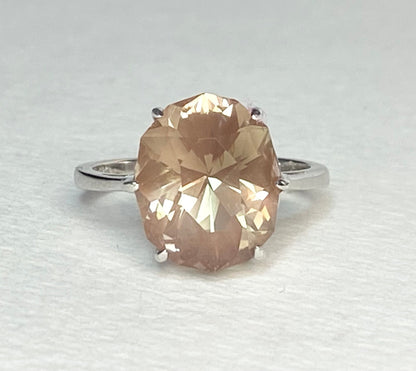 Oval fancy cut Oregon sunstone ring in sterling silver.