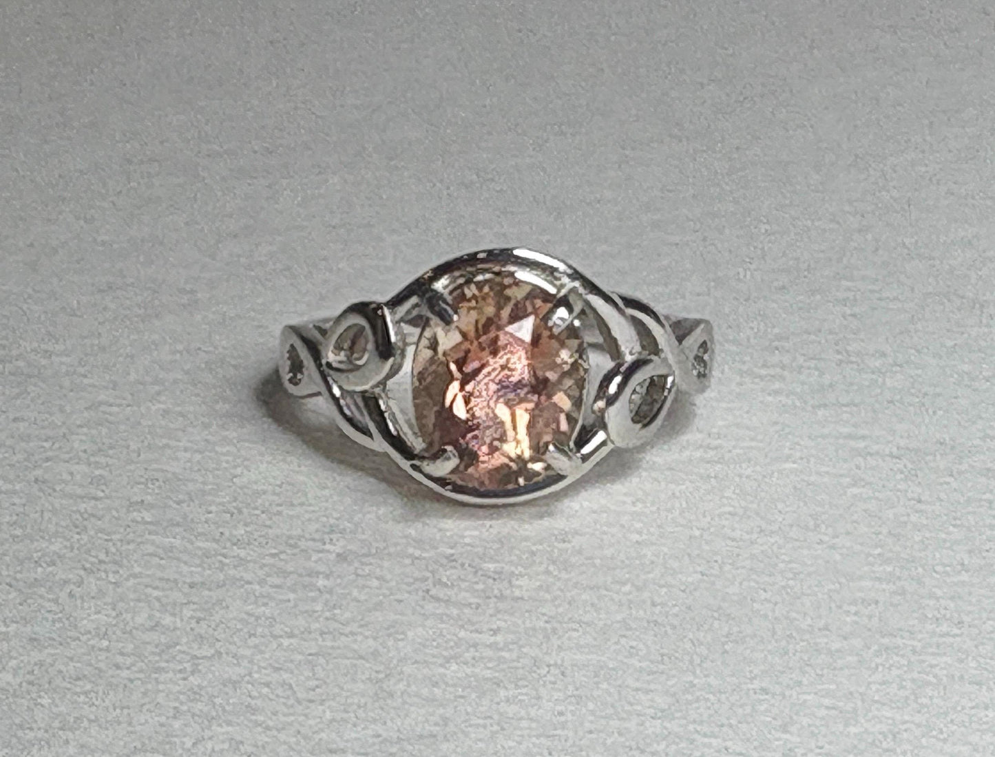 Oregon Sunstone free form ribbon ring in sterling silver.