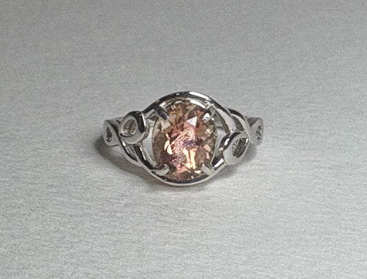 Oregon Sunstone free form ribbon ring in sterling silver.