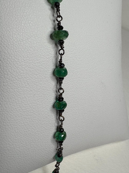 Oxidized sterling silver bracelet with faceted emeralds and black diamond beads.
