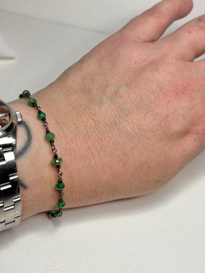 Natural emerald and black diamond bracelet in oxidized sterling silver.