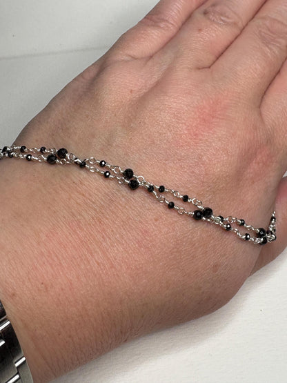 Sterling silver necklace with black diamond beads.