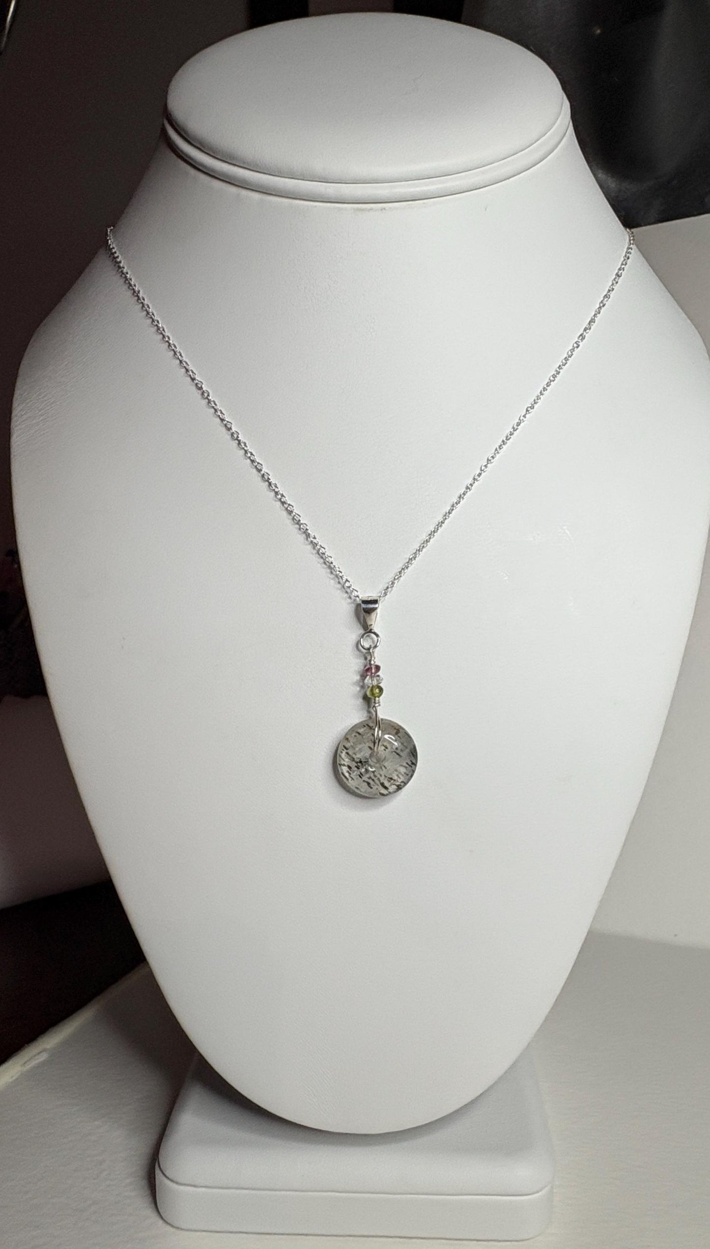 Sterling silver necklace with tourmalated quartz donut, Herkimer diamond, and tourmaline beads.