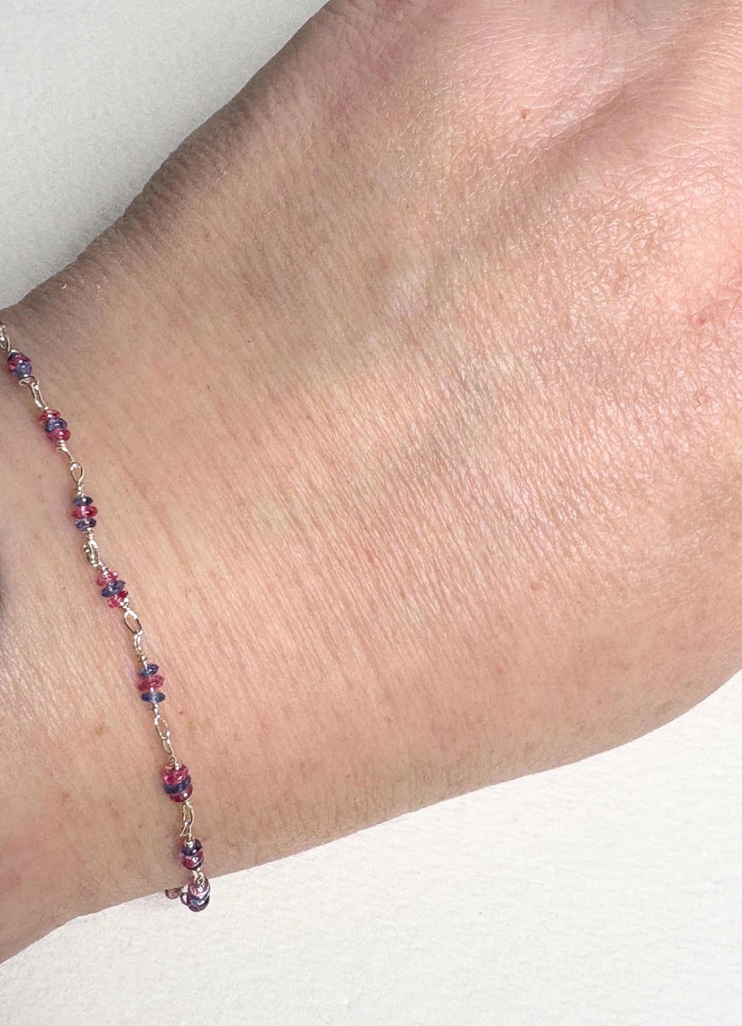 Dainty Burmese sapphire and spinel beaded bracelet in sterling silver.