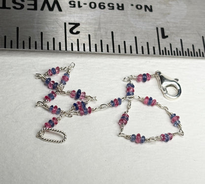 Dainty sterling silver bracelet with tiny Burmese sapphire and pink spinel beads.
