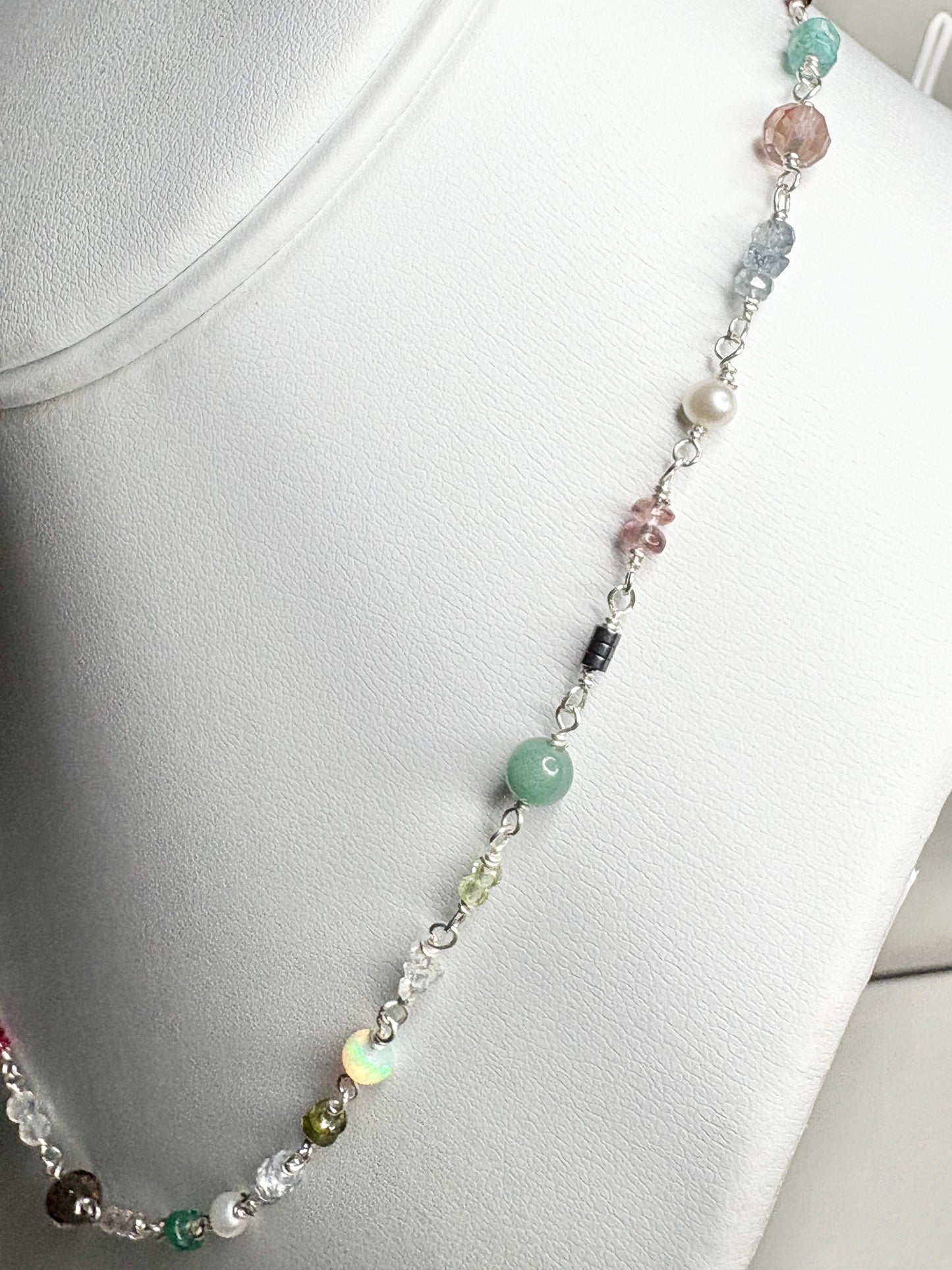 Sterling silver necklace with colorful natural gemstones and pearls.