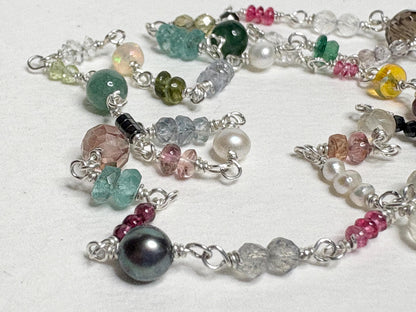 Sterling silver necklace with colorful natural gemstones and pearls.