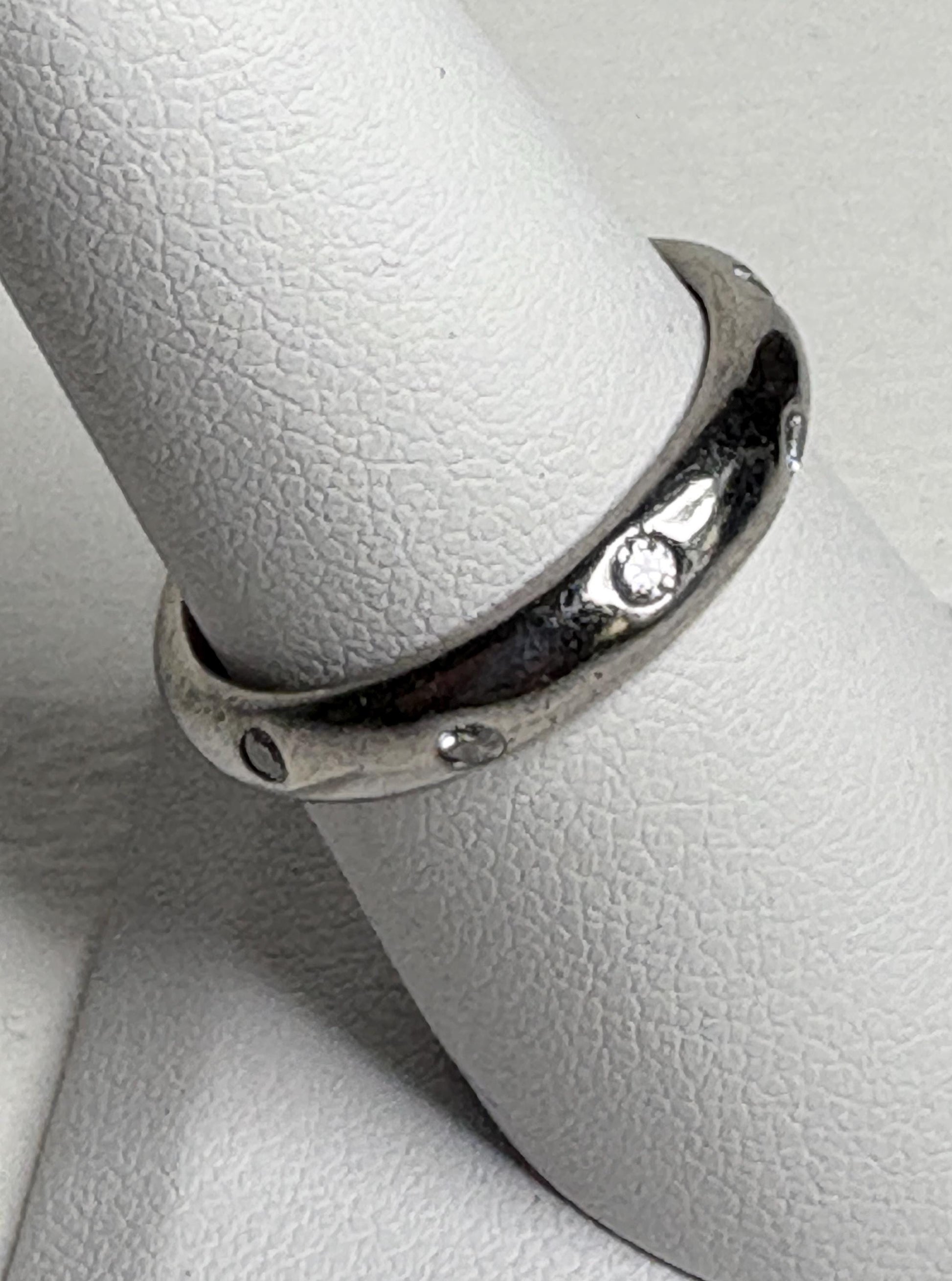 Tiffany & Co. platinum eternity band ring with diamonds.