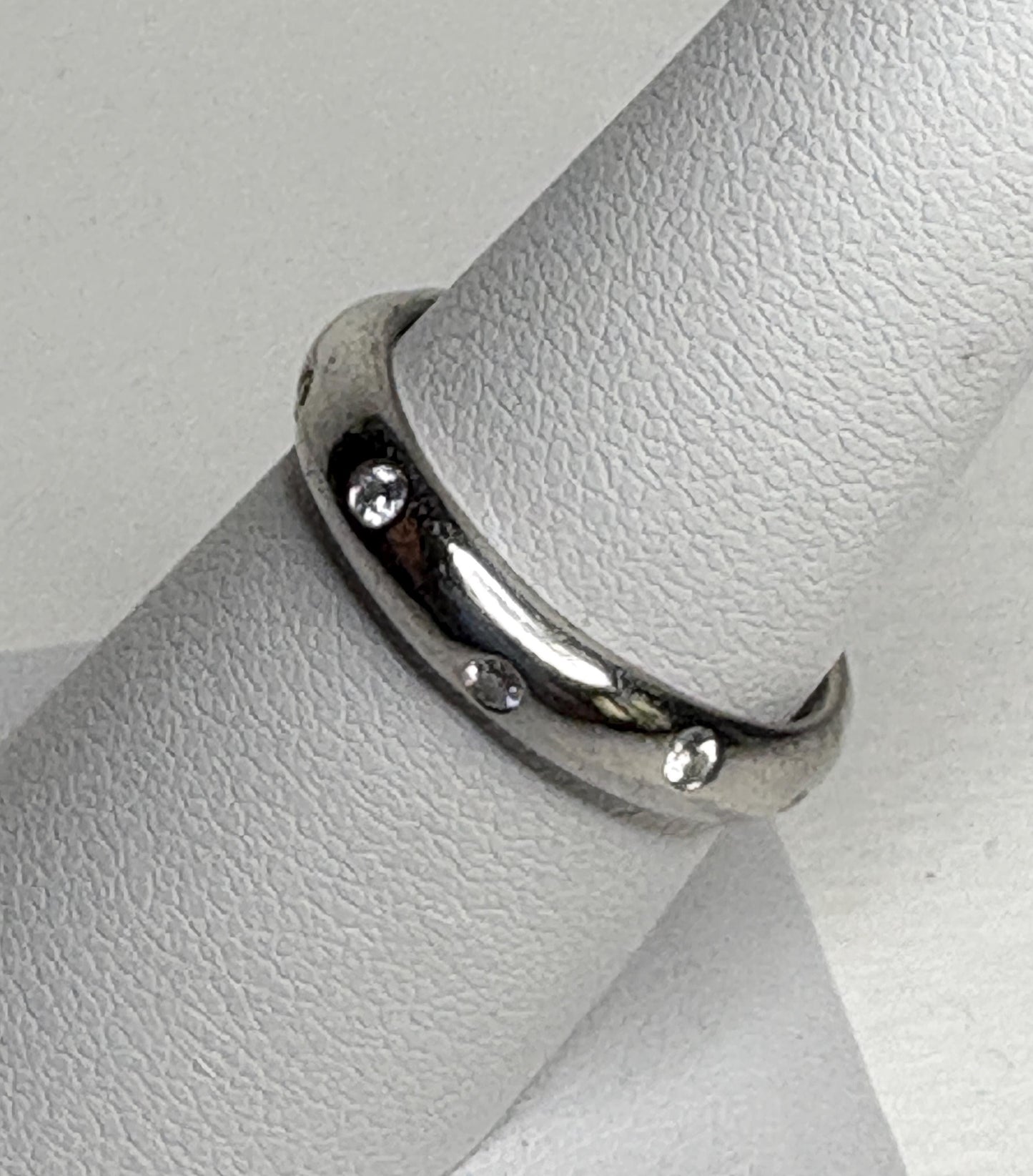 Tiffany & Co. platinum eternity band ring with diamonds.