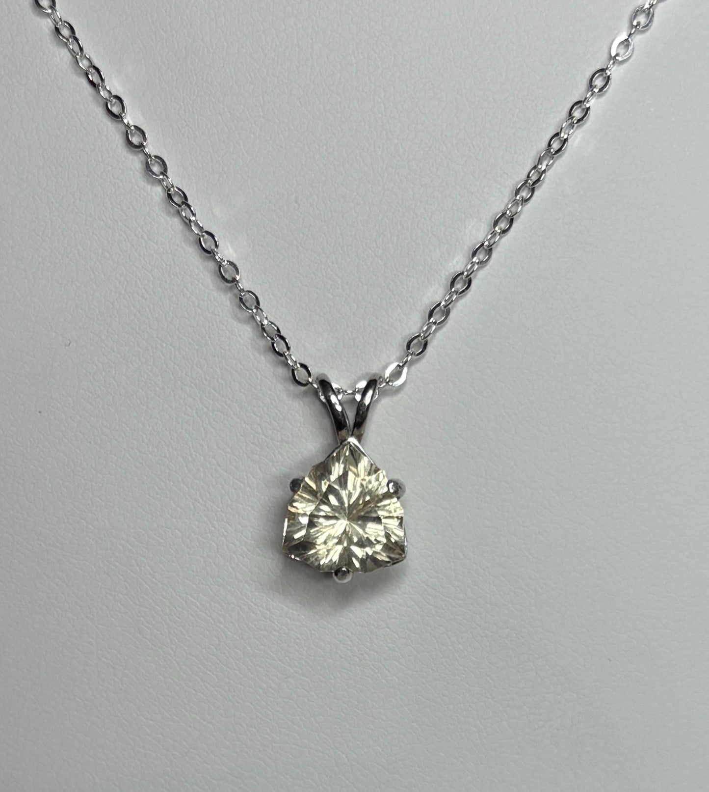 Sterling silver pendant necklace with a 10mm concave cut trillion Oregon sunstone.