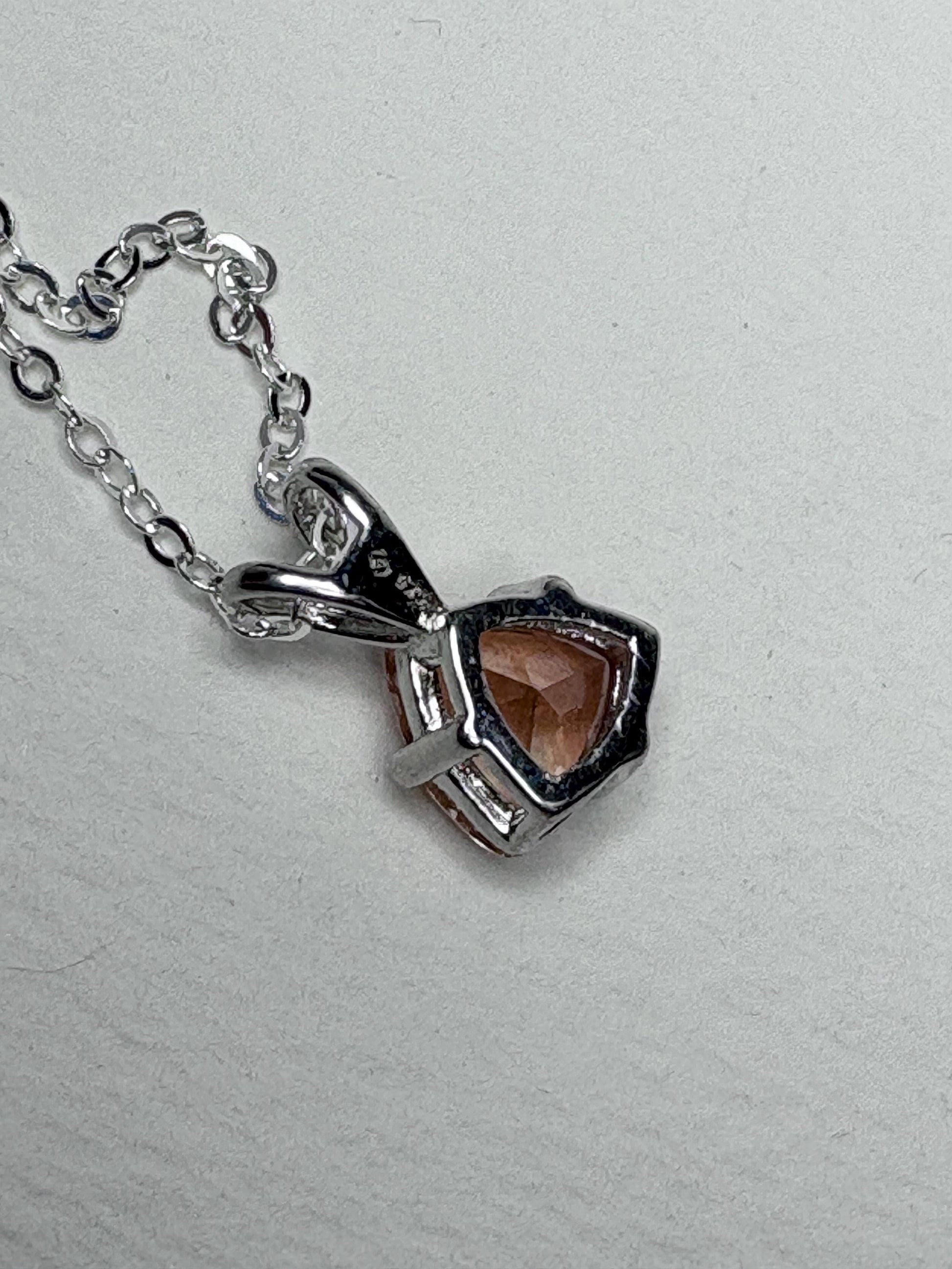 Sterling silver pendant necklace with an 8mm trillion peach Oregon sunstone.