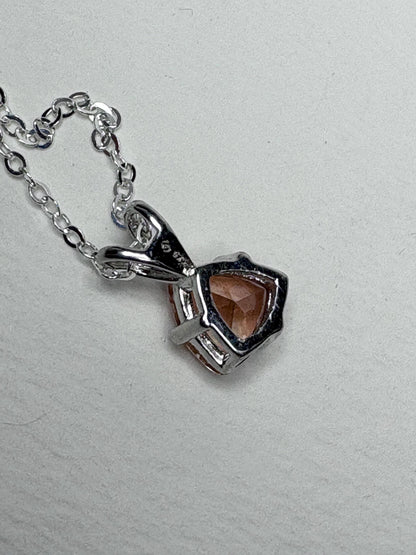 Sterling silver pendant necklace with an 8mm trillion peach Oregon sunstone.