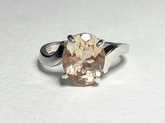 Oval champagne Oregon sunstone ring in sterling silver.