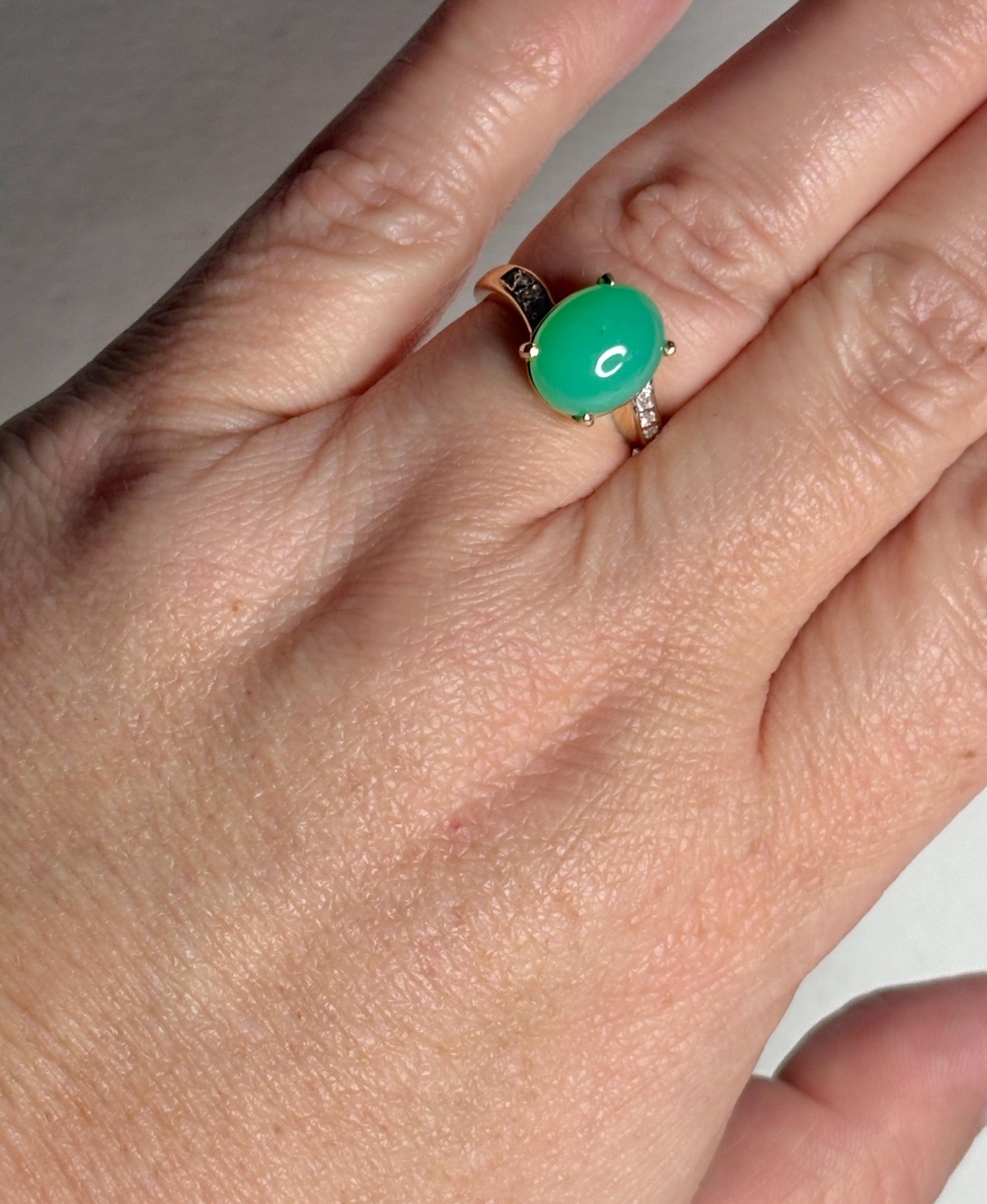 14k gold ring with oval Australian chrysoprase and diamond accents.