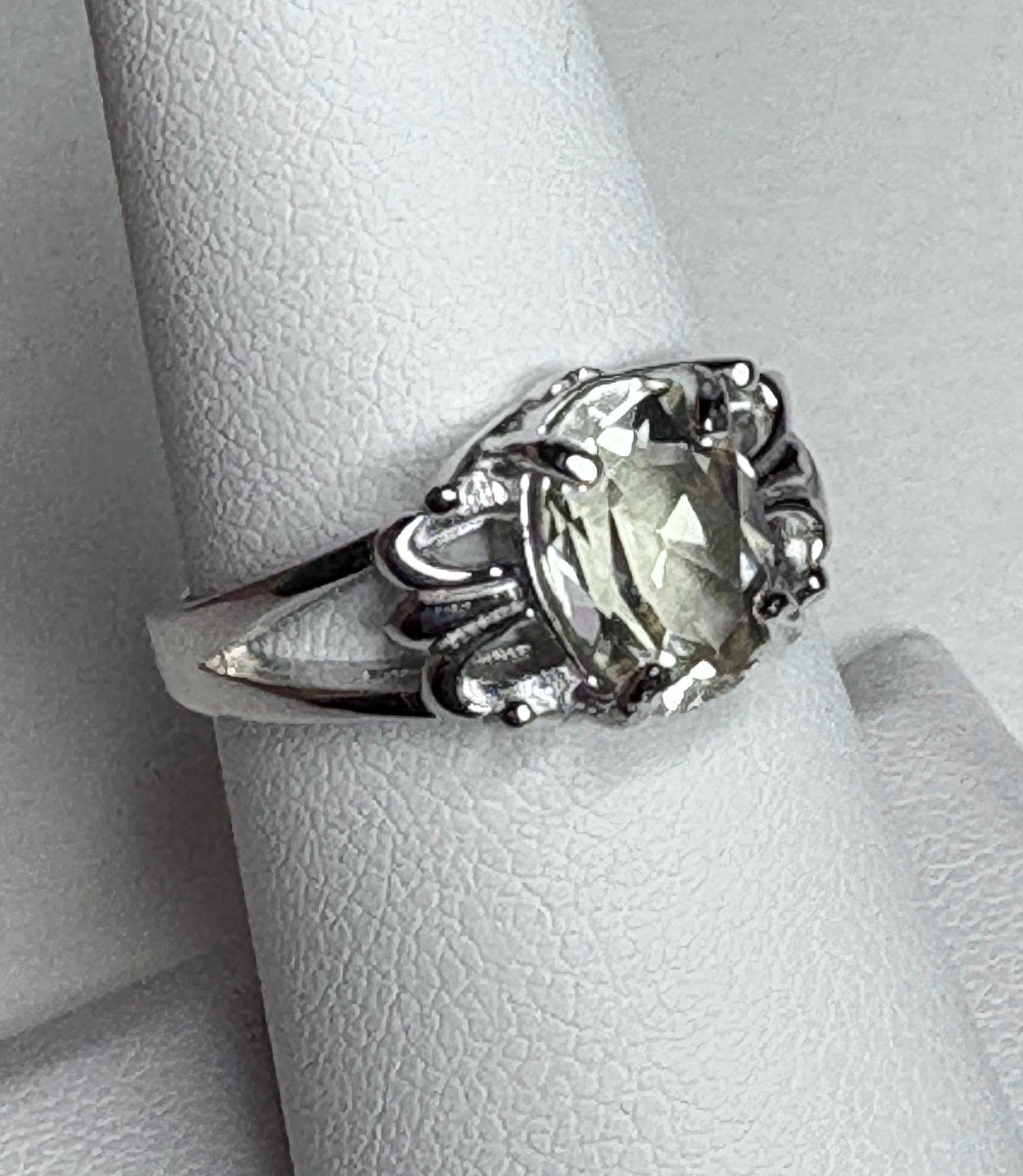 Sterling silver ring with a yellow Oregon sunstone in a fleur de lis design.