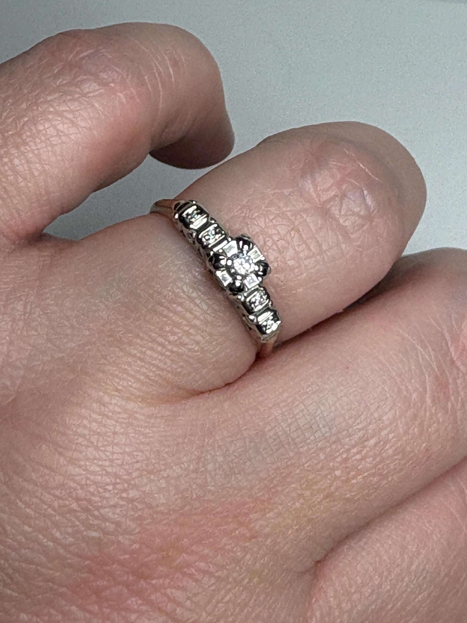 Vintage 14k gold two-tone ring with small diamonds.