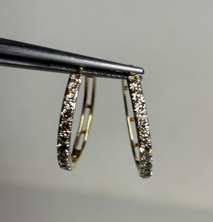 Hoop earrings with champagne diamonds set in 10k gold.