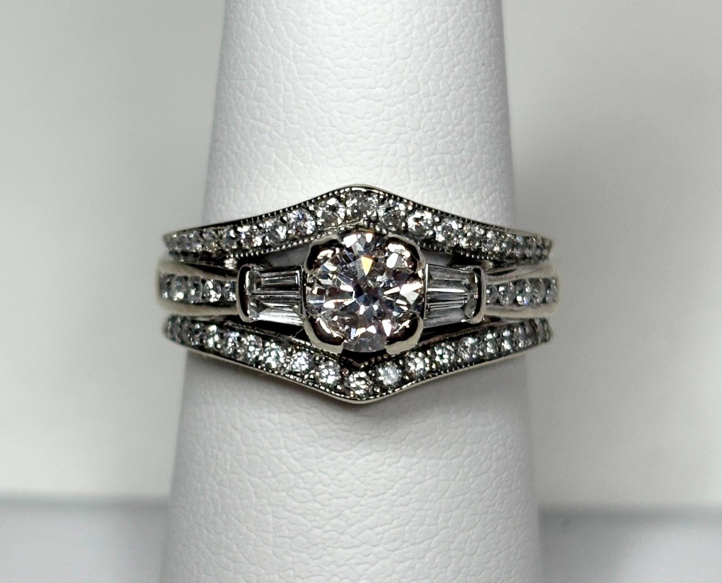 14k white gold ring with round and baguette diamonds.