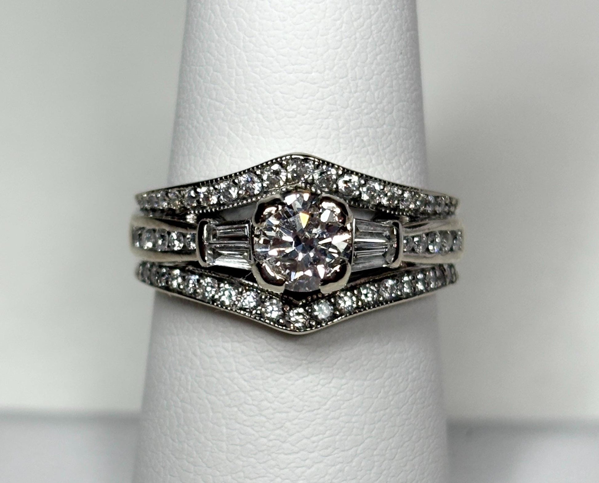 14k white gold ring with round and baguette diamonds.