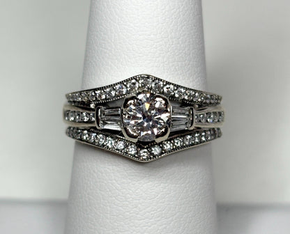 14k white gold ring with round and baguette diamonds.