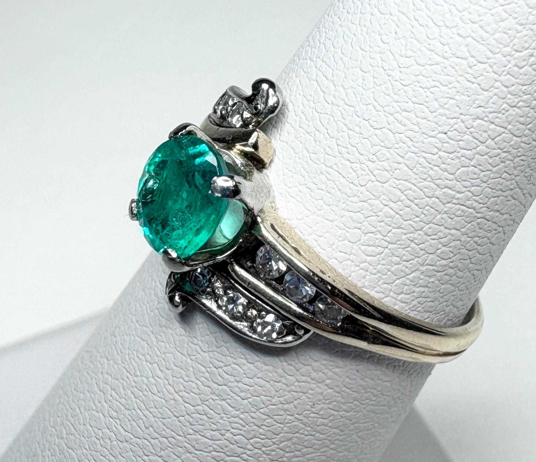 Vintage 14k gold ring with emerald and single cut diamonds.