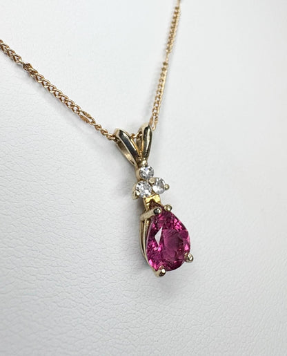 14k gold necklace with a pear-shaped rubellite tourmaline and diamonds.