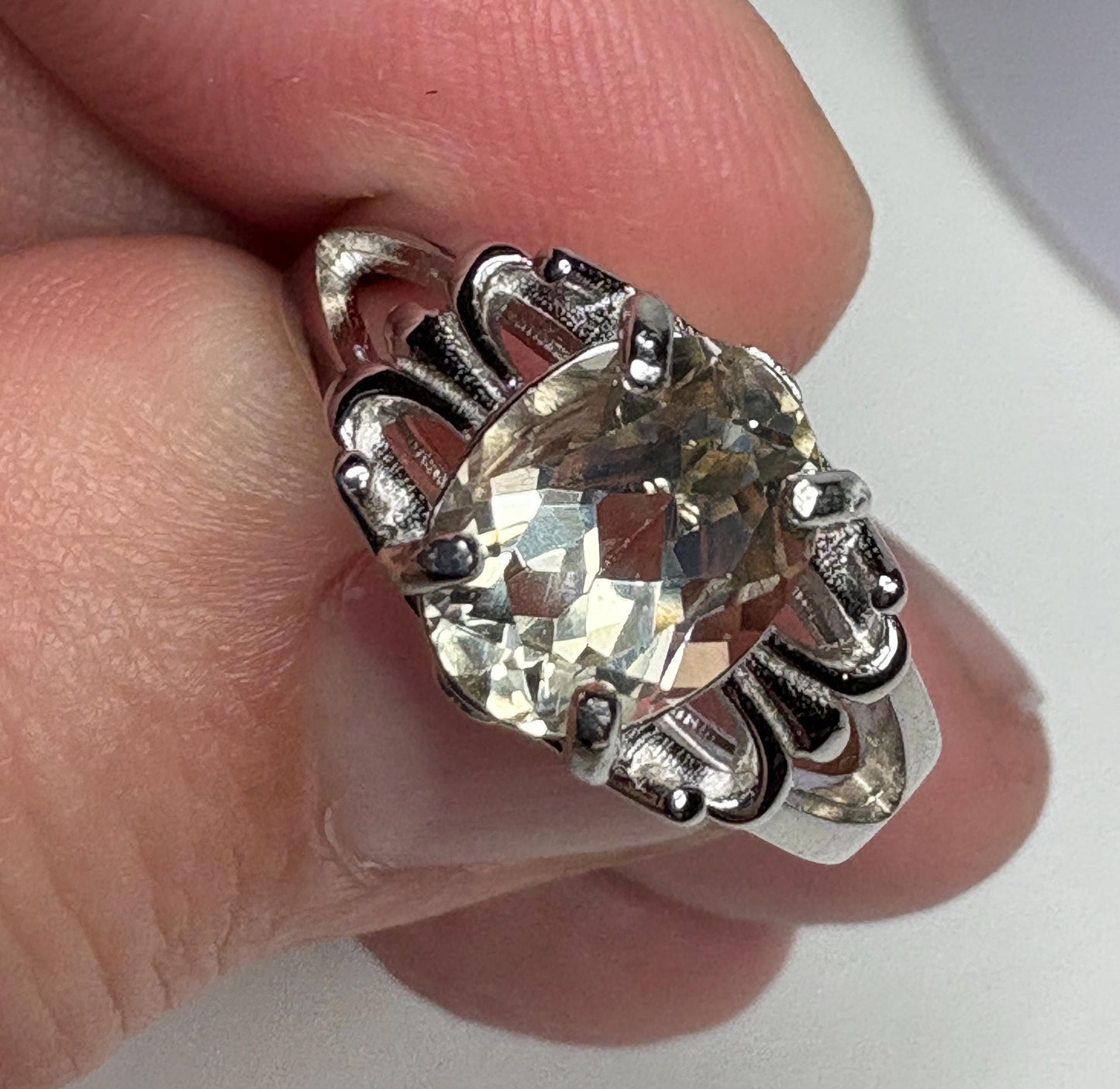 Yellow Oregon sunstone ring with fleur de lis design in sterling silver.