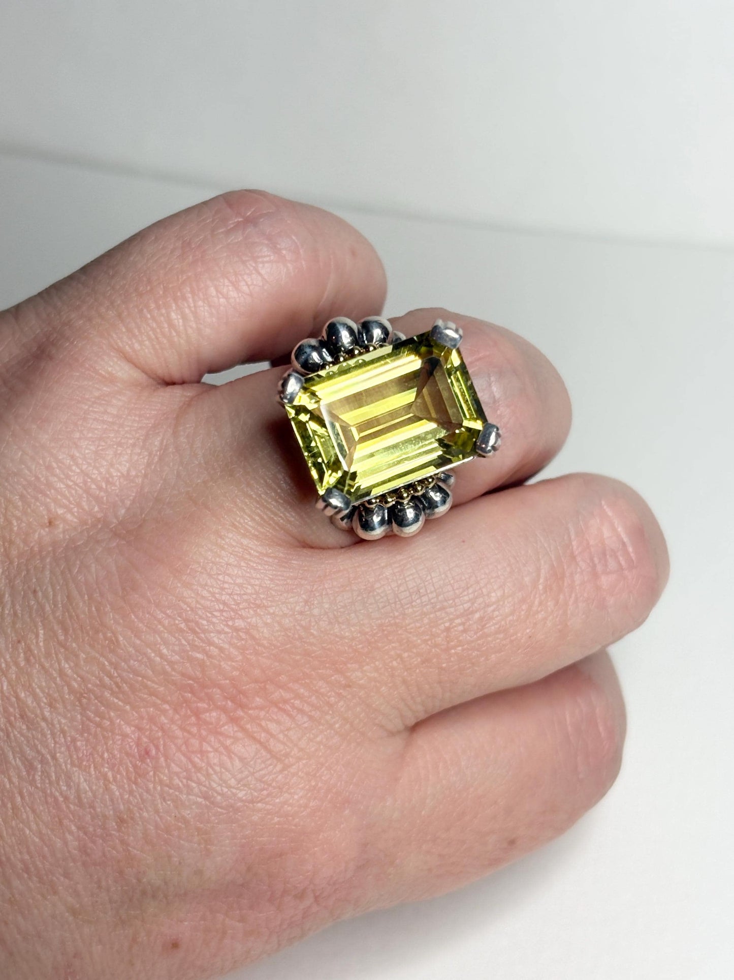 Lagos sterling silver ring with 18k gold caviar accents and a large lemon quartz.