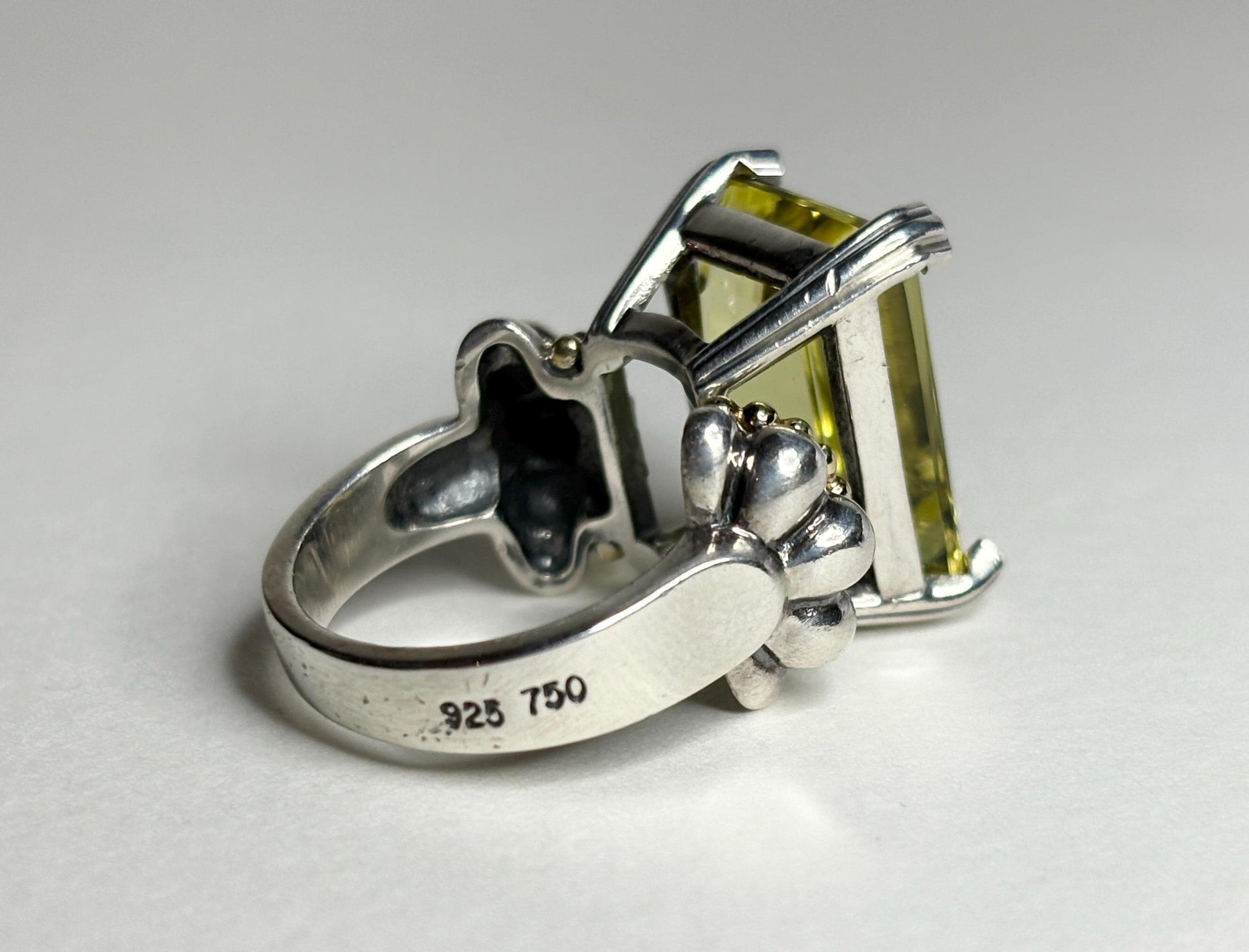 Lagos sterling silver ring with 18k gold caviar accents and a large lemon quartz.
