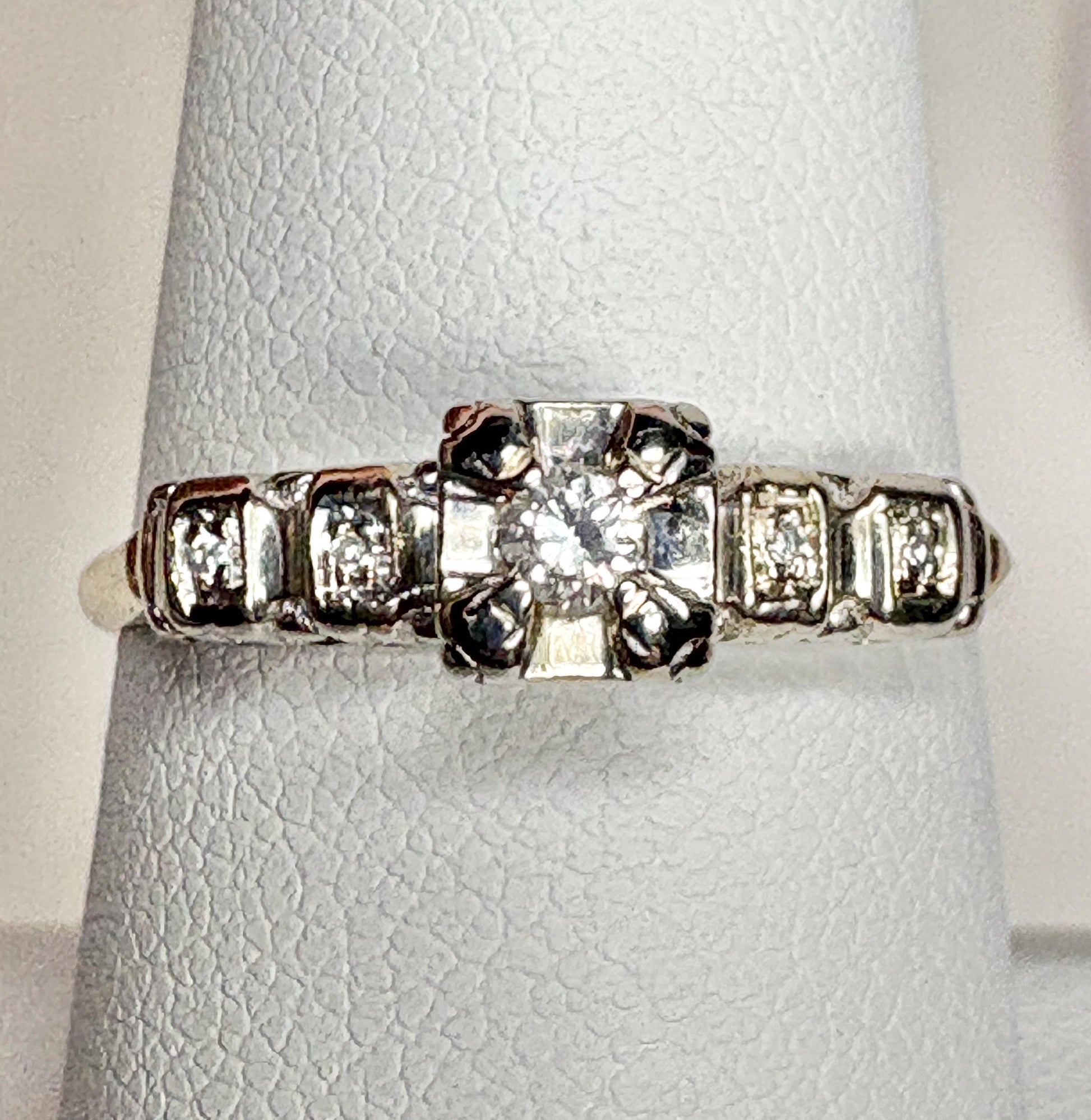 Vintage 14k two-tone gold engagement ring with diamonds.