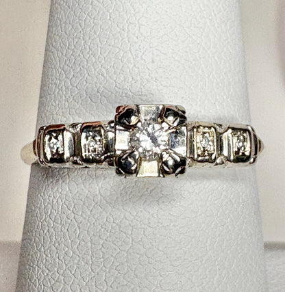 Vintage 14k two-tone gold engagement ring with diamonds.