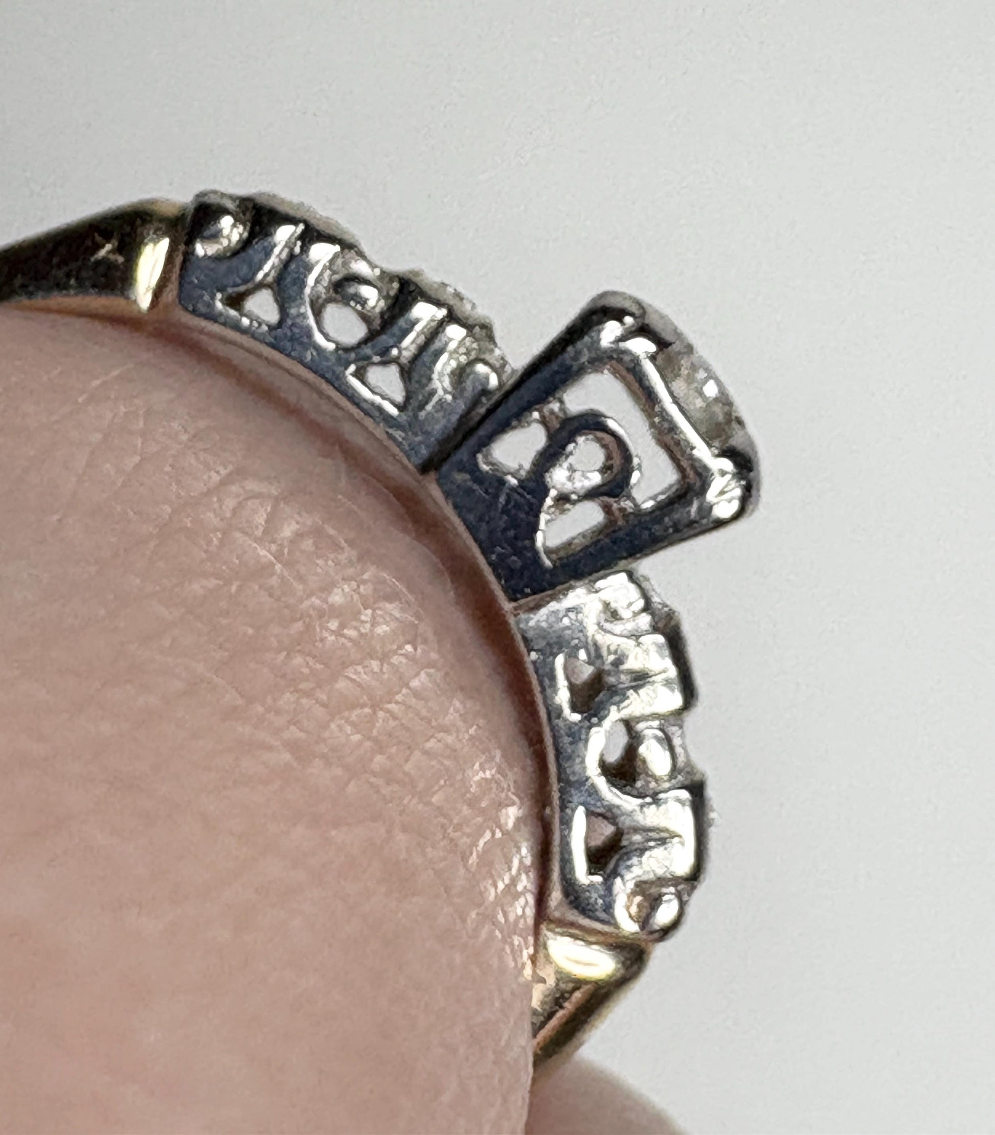 Vintage 14k two-tone gold engagement ring with small diamonds.