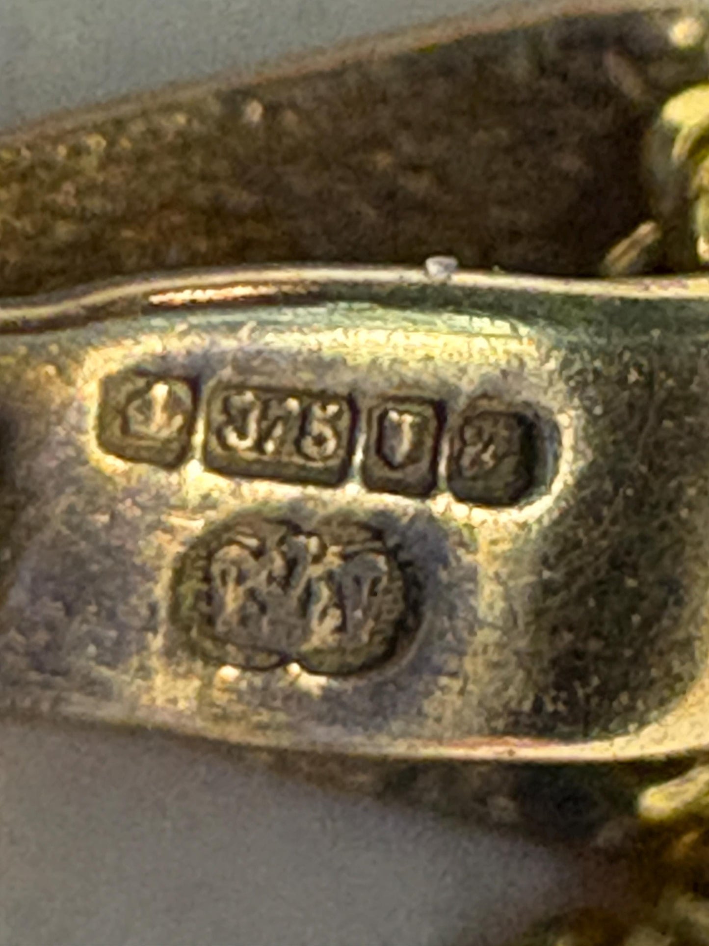 Vintage 9k gold pendant necklace with amethyst and British hallmarks.