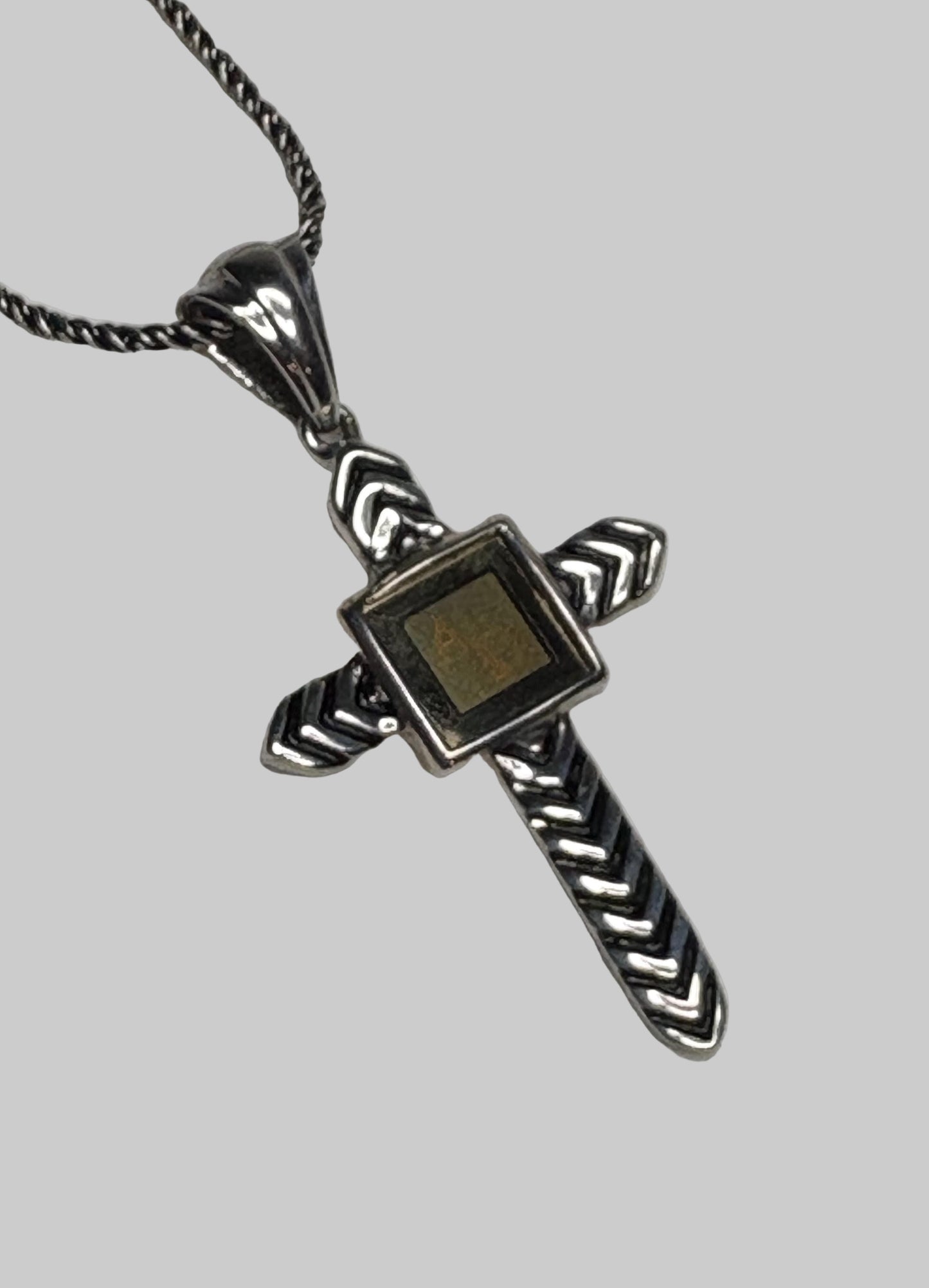 Sterling silver cross pendant necklace with a nano laser inscribed Bible under glass.