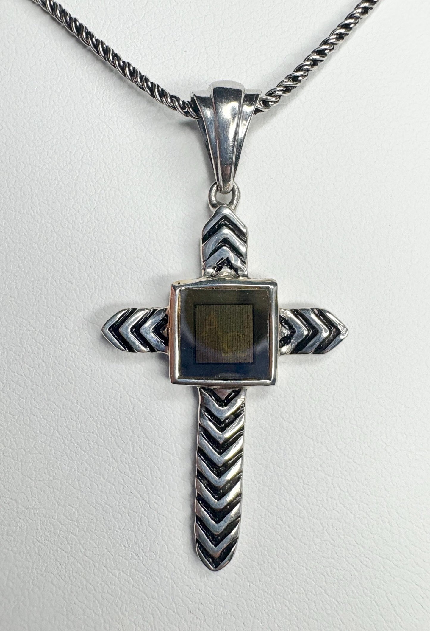 Sterling silver cross pendant necklace with a nano laser inscribed Bible under glass.