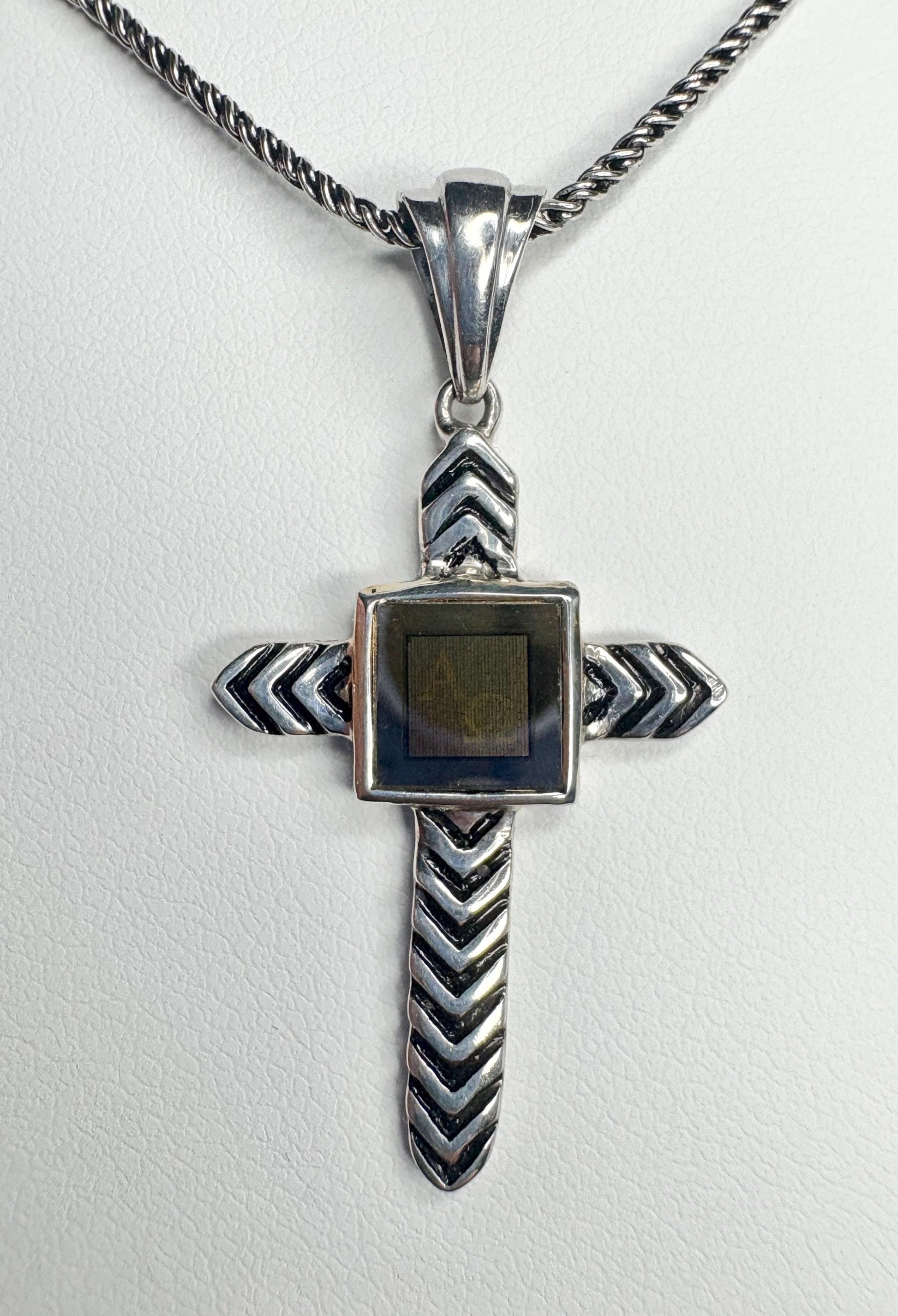 Sterling silver cross pendant necklace with a nano laser inscribed Bible under glass.